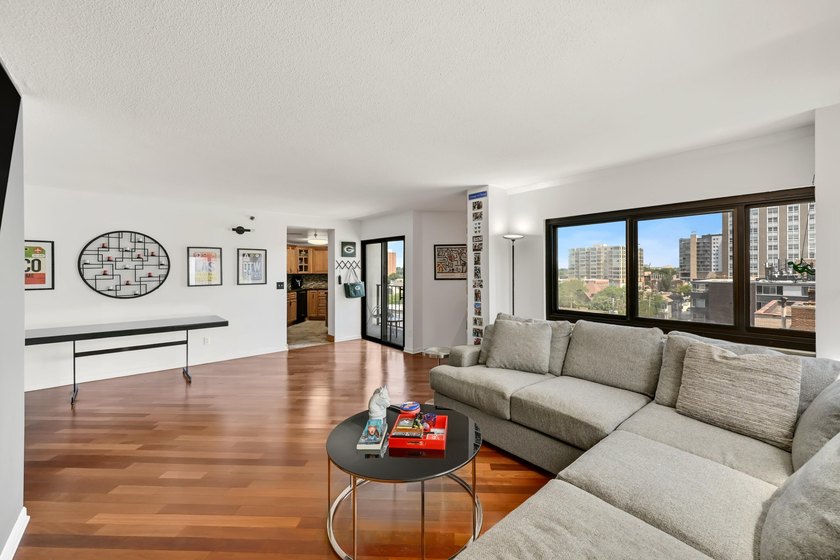 Experience elevated city living in this beautifully maintained - photo 9