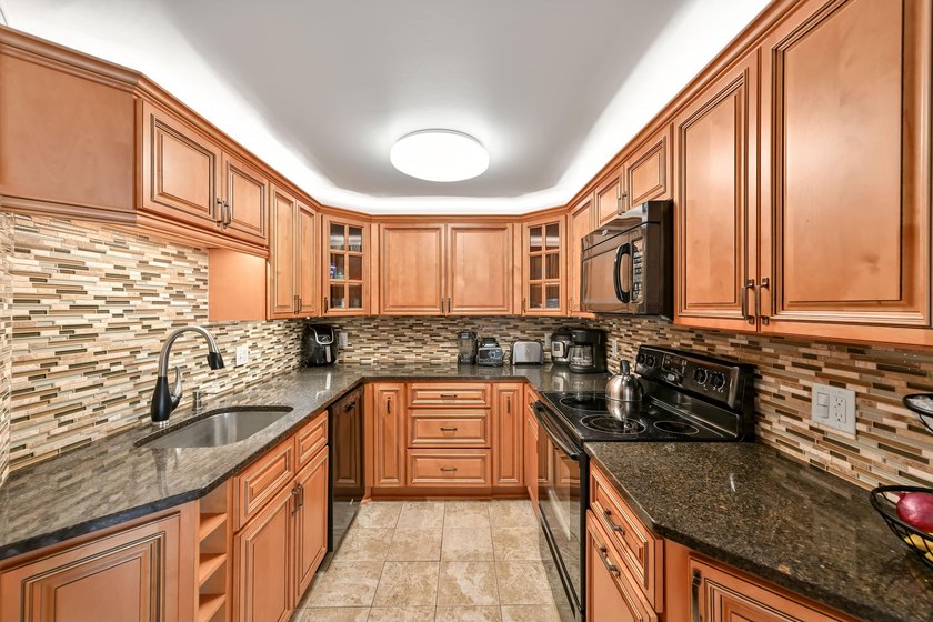 Experience elevated city living in this beautifully maintained - photo 10