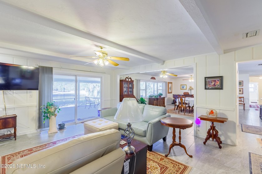 Wake up to peaceful lake views in this beautifully updated - photo 11