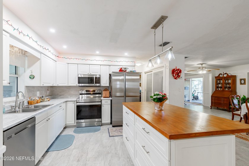 Wake up to peaceful lake views in this beautifully updated - photo 15