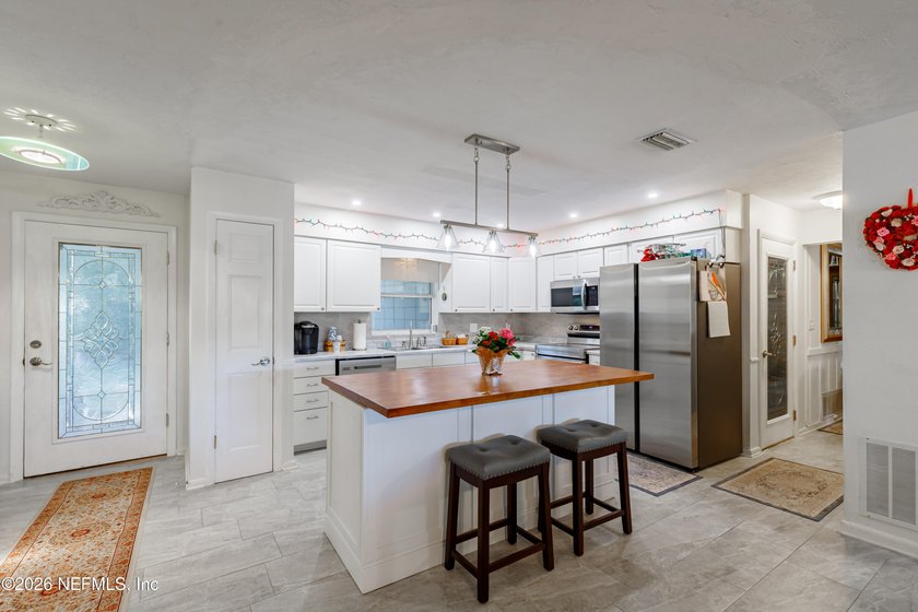Wake up to peaceful lake views in this beautifully updated - photo 17