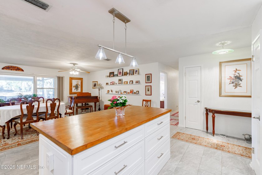 Wake up to peaceful lake views in this beautifully updated - photo 19