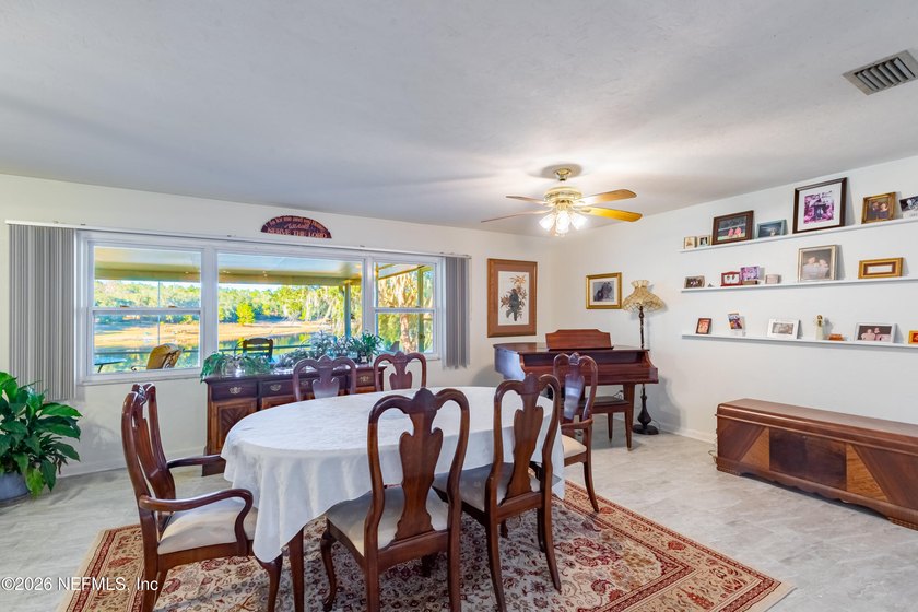 Wake up to peaceful lake views in this beautifully updated - photo 22