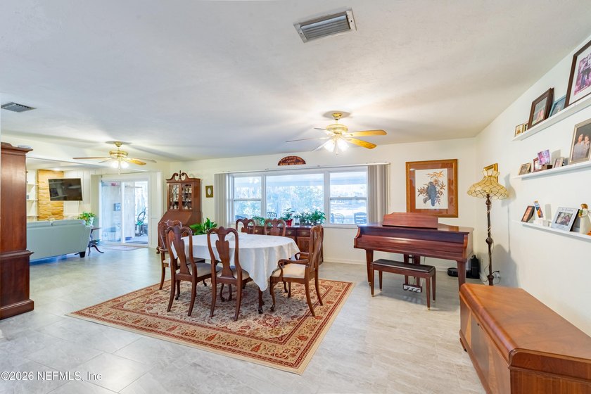 Wake up to peaceful lake views in this beautifully updated - photo 23