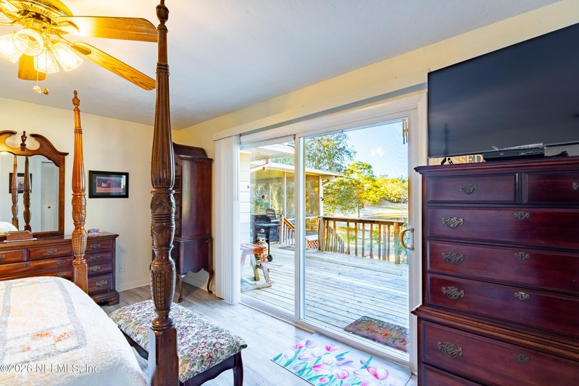 Wake up to peaceful lake views in this beautifully updated - photo 25