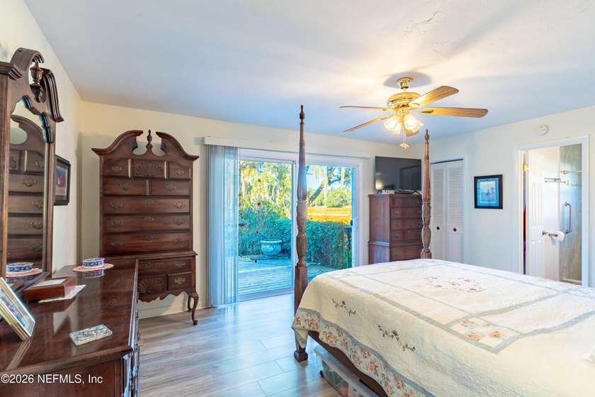Wake up to peaceful lake views in this beautifully updated - photo 26