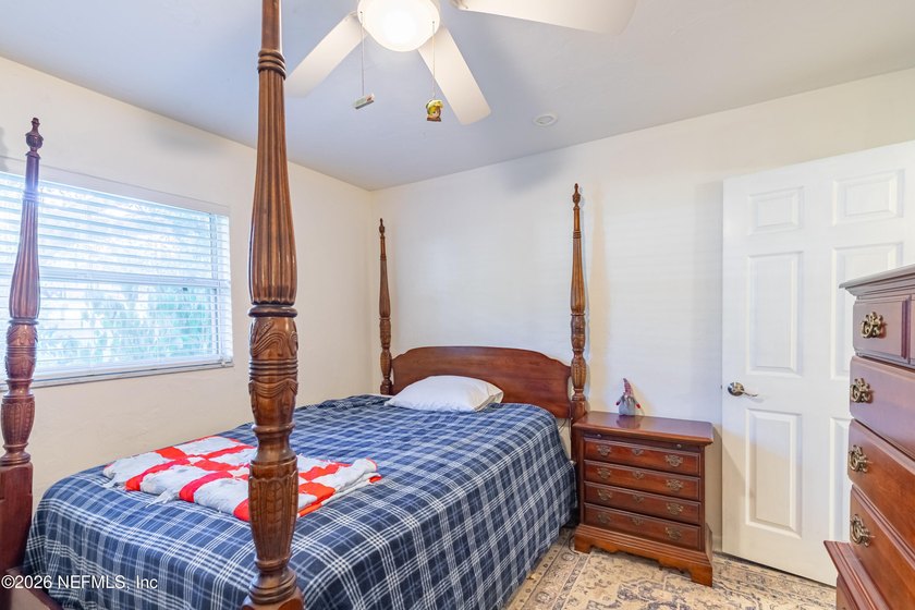 Wake up to peaceful lake views in this beautifully updated - photo 31