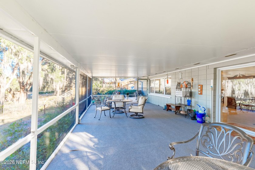 Wake up to peaceful lake views in this beautifully updated - photo 33