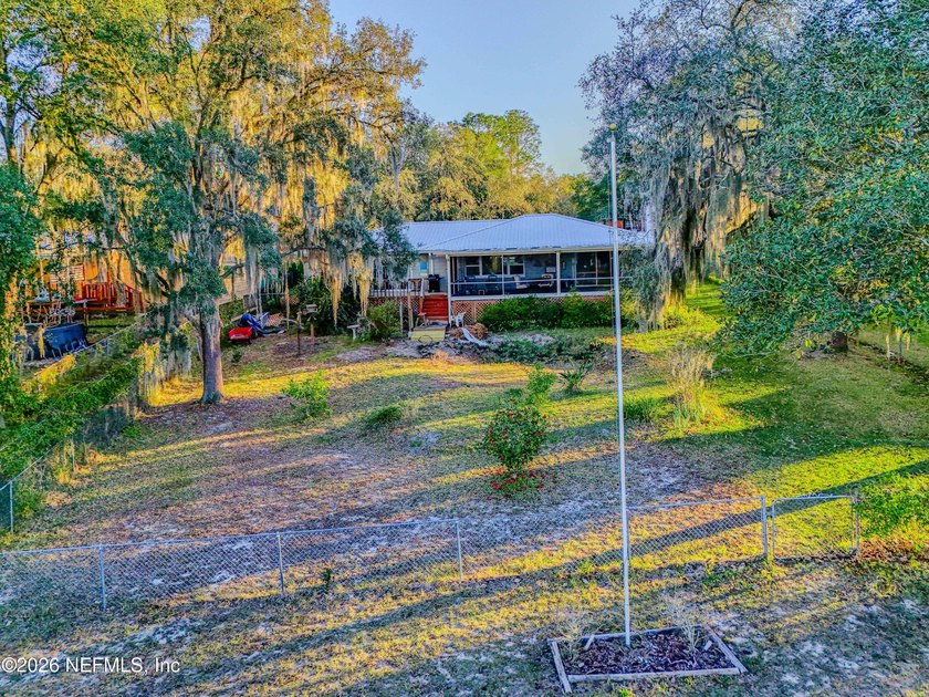 Wake up to peaceful lake views in this beautifully updated - photo 34