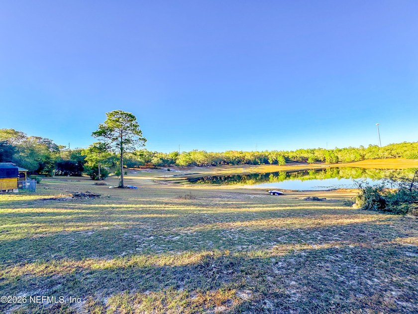Wake up to peaceful lake views in this beautifully updated - photo 35