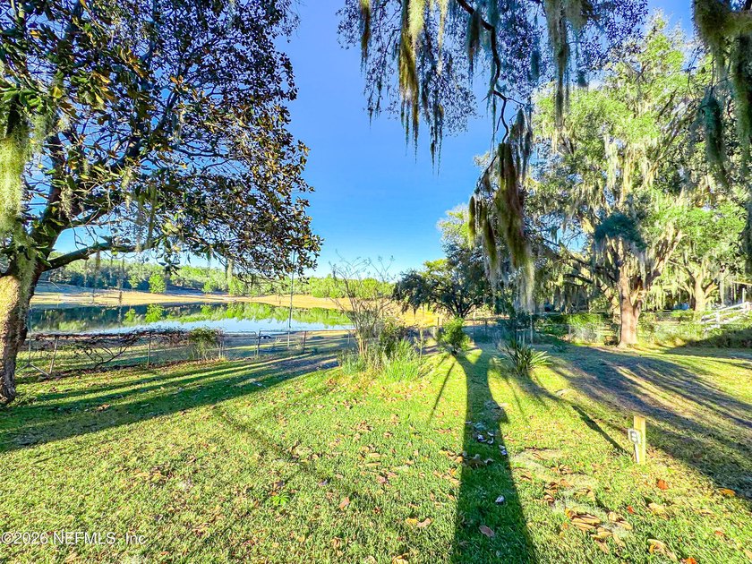 Wake up to peaceful lake views in this beautifully updated - photo 37
