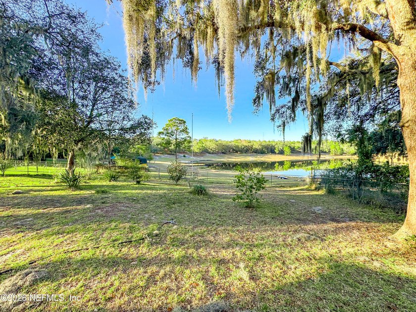 Wake up to peaceful lake views in this beautifully updated - photo 38