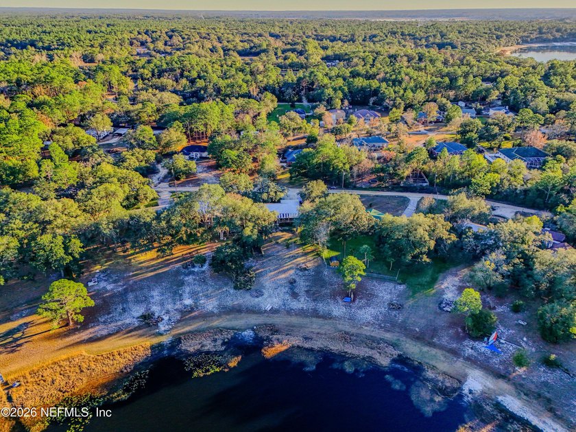 Wake up to peaceful lake views in this beautifully updated - photo 42