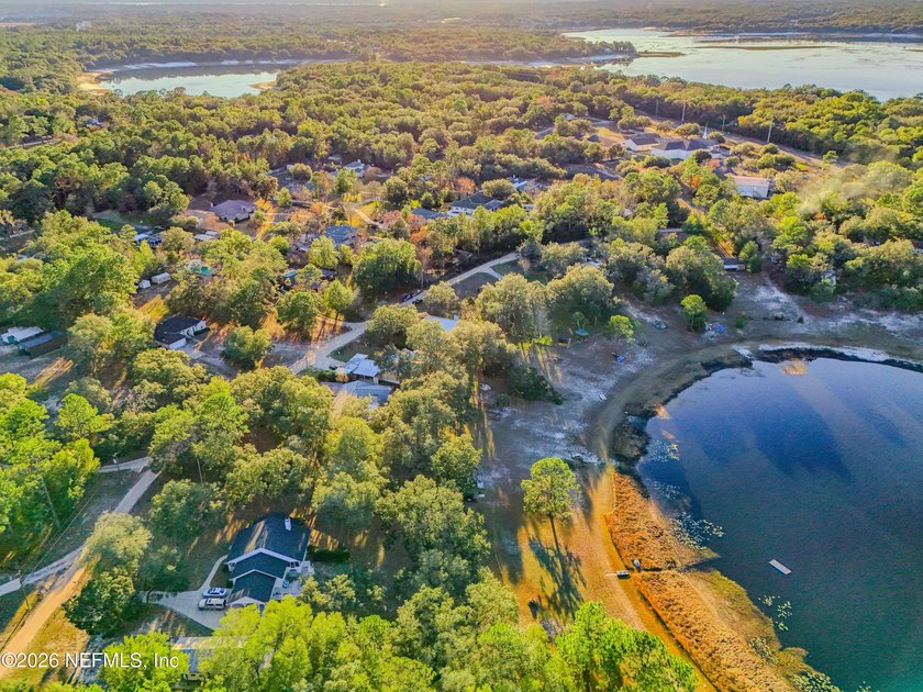 Wake up to peaceful lake views in this beautifully updated - photo 43