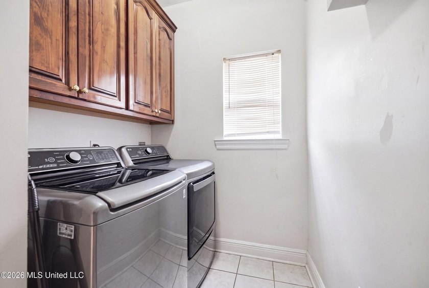 Welcome to this spacious 5-bedroom, 3.5 bath two story brick - photo 49