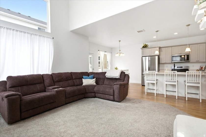 PRICE IMPROVEMENT .. Sellers also just updated lighting in the - photo 6