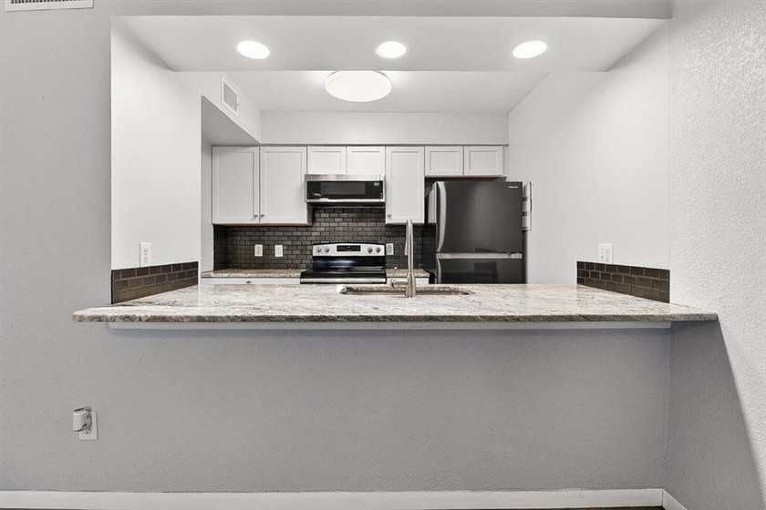 Pretty end unit offering extra privacy. Overlooks the old - photo 6