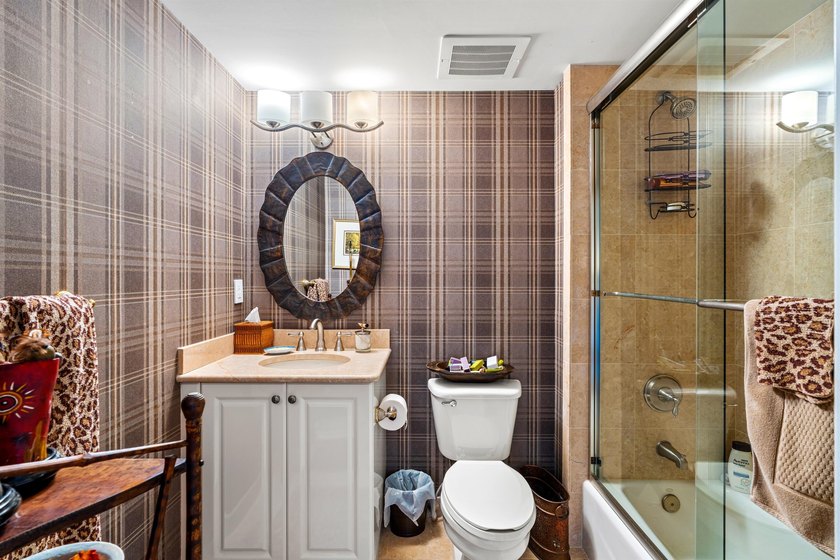 Welcome to this sophisticated two-bedroom, two-and-a-half-bath - photo 26