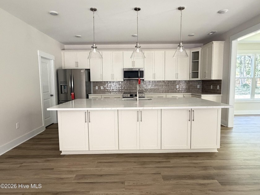 Located in the lakefront community of the Bluffs with a lovely - photo 8