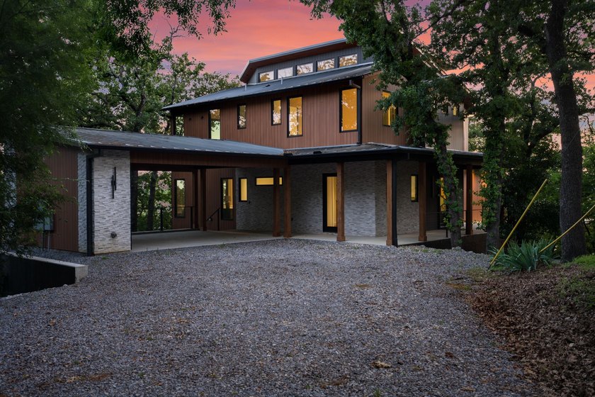 Experience a new level of lakeside living in the exclusive - photo 2
