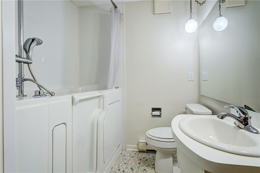 Conveniently located near Lake Ontario, this spacious 3-bedroom - photo 15