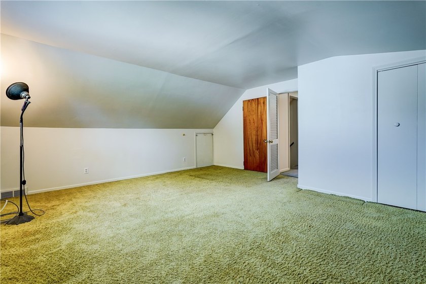 Conveniently located near Lake Ontario, this spacious 3-bedroom - photo 16