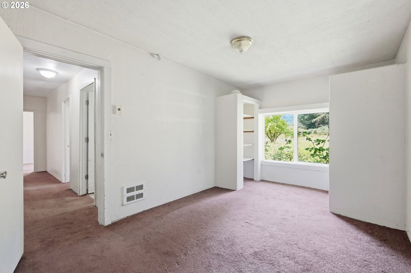 So much potential in this lovely riverfront property located - photo 25