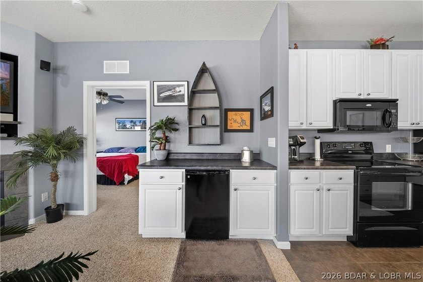 Welcome to effortless lakefront living at this beautifully - photo 13