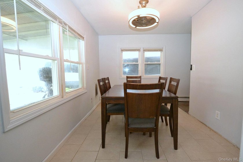 Welcome to 111 Fuller Ave in Islip! This charming, five-bedroom - photo 2