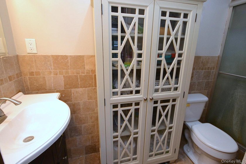 Welcome to 111 Fuller Ave in Islip! This charming, five-bedroom - photo 3