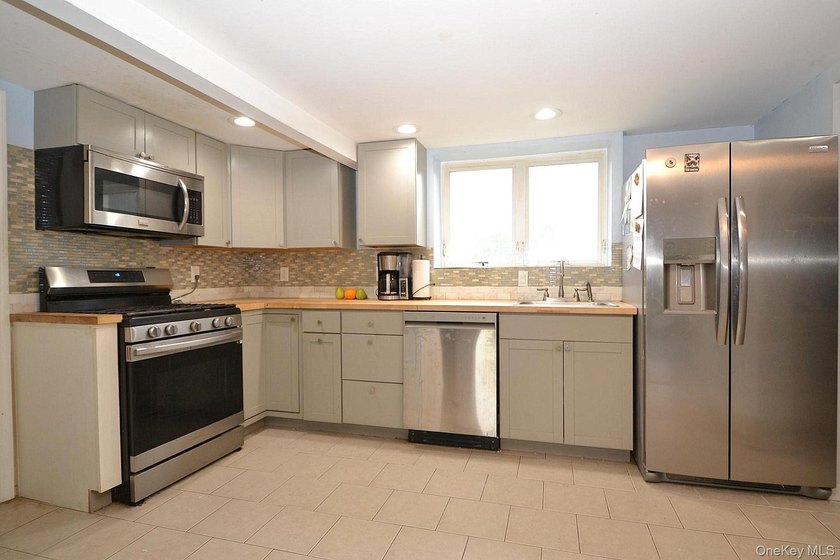 Welcome to 111 Fuller Ave in Islip! This charming, five-bedroom - photo 4