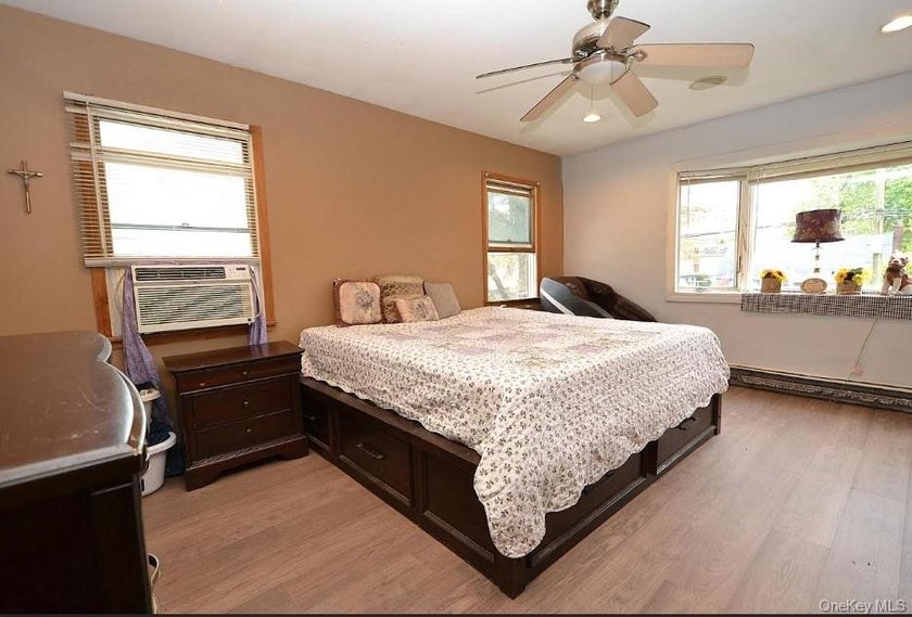 Welcome to 111 Fuller Ave in Islip! This charming, five-bedroom - photo 8