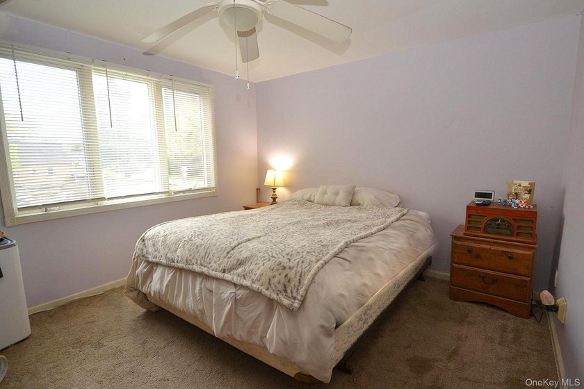 Welcome to 111 Fuller Ave in Islip! This charming, five-bedroom - photo 9