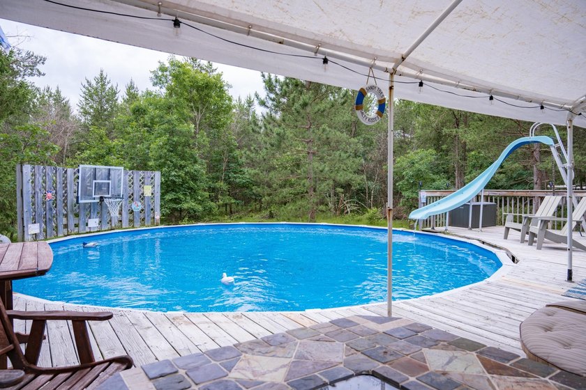 Tucked away on 6 secluded wooded acres, this 4BR, 2.5BA ranch - photo 16