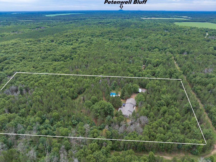 Tucked away on 6 secluded wooded acres, this 4BR, 2.5BA ranch - photo 22