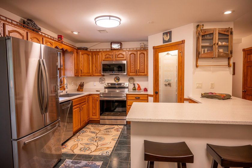 Tucked away on 6 secluded wooded acres, this 4BR, 2.5BA ranch - photo 34