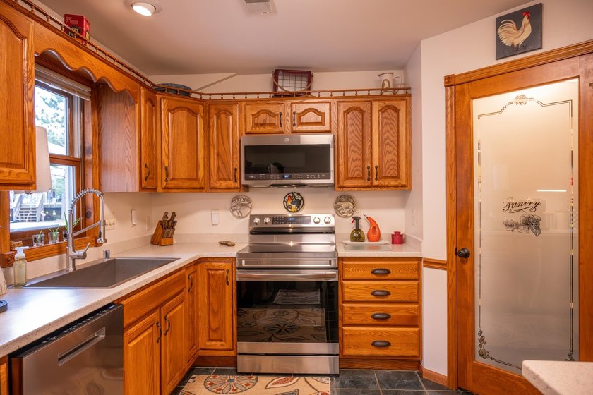 Tucked away on 6 secluded wooded acres, this 4BR, 2.5BA ranch - photo 35