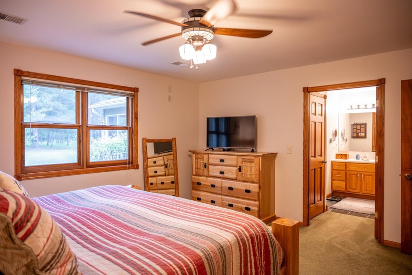 Tucked away on 6 secluded wooded acres, this 4BR, 2.5BA ranch - photo 42