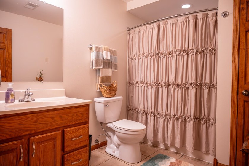 Tucked away on 6 secluded wooded acres, this 4BR, 2.5BA ranch - photo 47