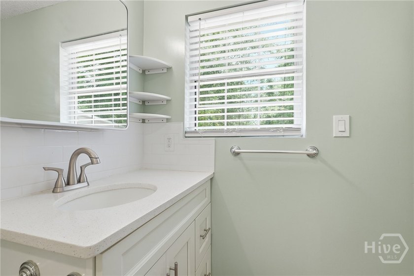 Located just minutes from Thunderbolt, this beautifully updated - photo 22