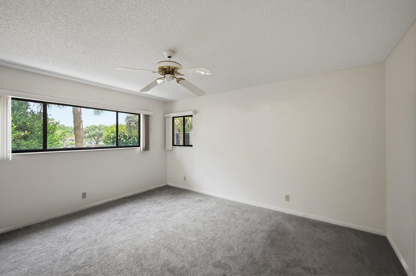 Spacious 2-bedroom, 2-bath corner unit located on the second - photo 12