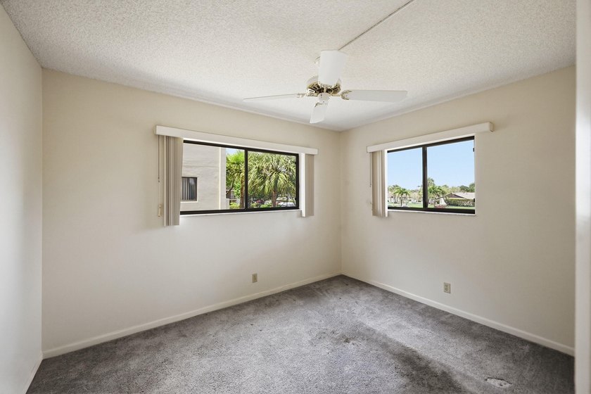Spacious 2-bedroom, 2-bath corner unit located on the second - photo 14