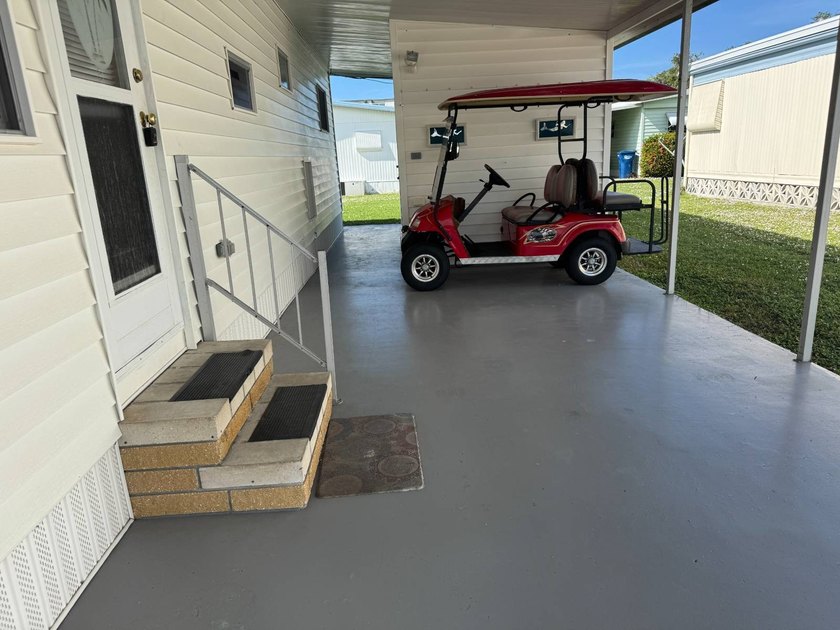 This 1971 home is offered turnkey and includes the golf cart! - photo 5