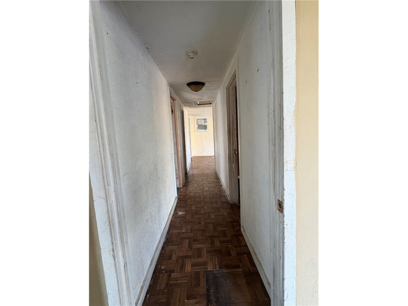 This 3-bedroom, 1-bath home sits on a large lot and offers - photo 3