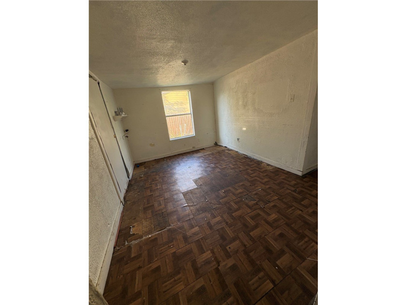 This 3-bedroom, 1-bath home sits on a large lot and offers - photo 8