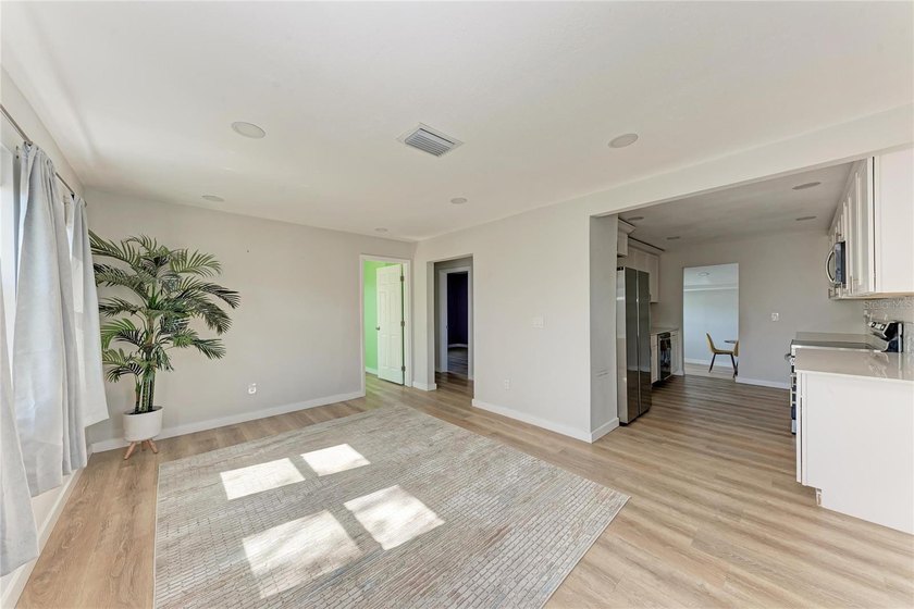Short Sale. Welcome to this beautifully updated 4-bedroom - photo 2
