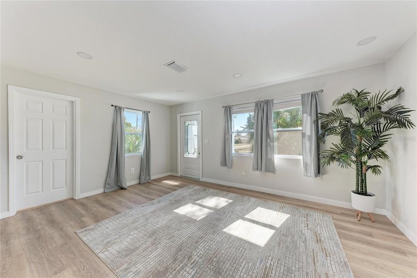 Short Sale. Welcome to this beautifully updated 4-bedroom - photo 3