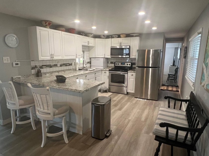 NEW LOWER PRICE! Location, location, location! Four Seasons - photo 8