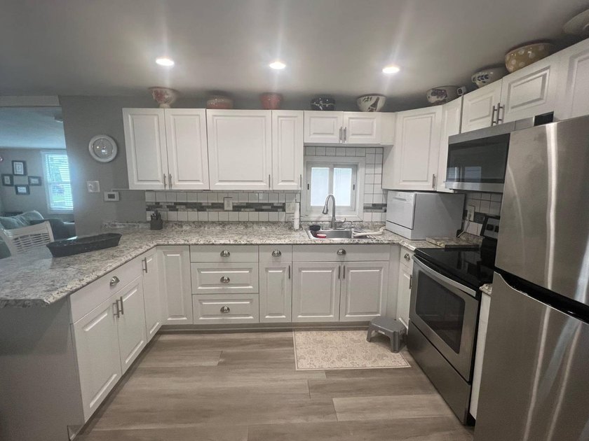 NEW LOWER PRICE! Location, location, location! Four Seasons - photo 9