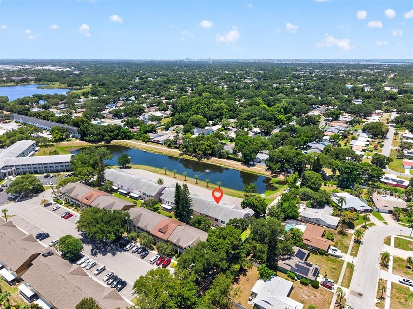 Wake up to peaceful views of a sparkling fountain pond from this - photo 16